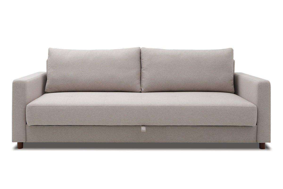 Three-seat sofa bed with plush cushions